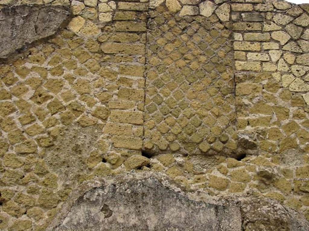 VI.7, Herculaneum. May 2003. Detail of blocked window/doorway in upper north wall at east end.
Photo courtesy of Nicolas Monteix.